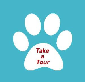 river-dog-inn-white-paw-w-blue-background-and-red-writing-take-a-tour